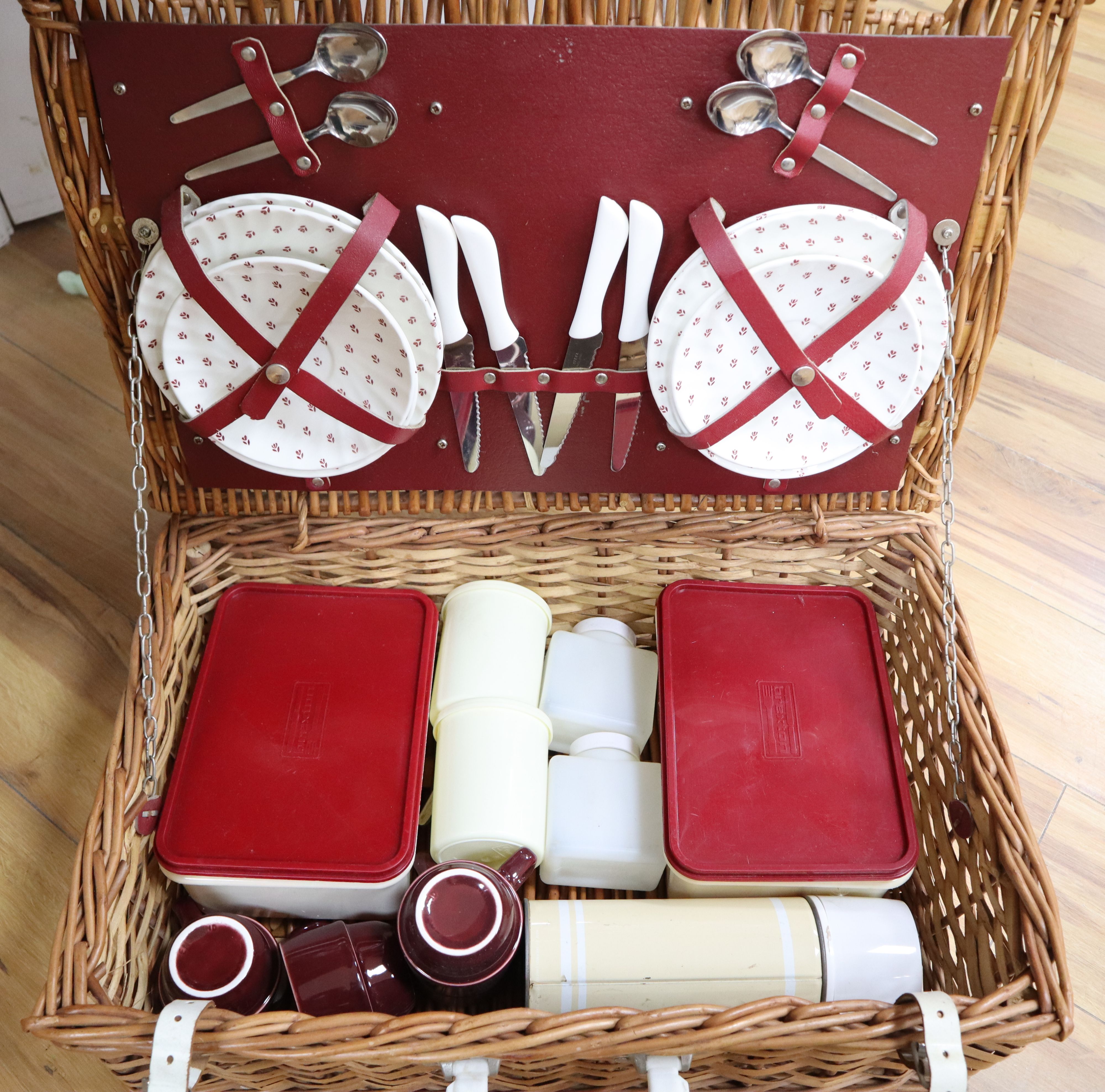 A wicker cased picnic set